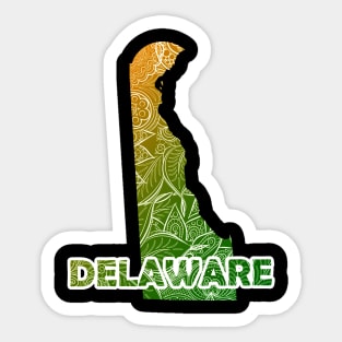 Colorful mandala art map of Delaware with text in green and orange Sticker